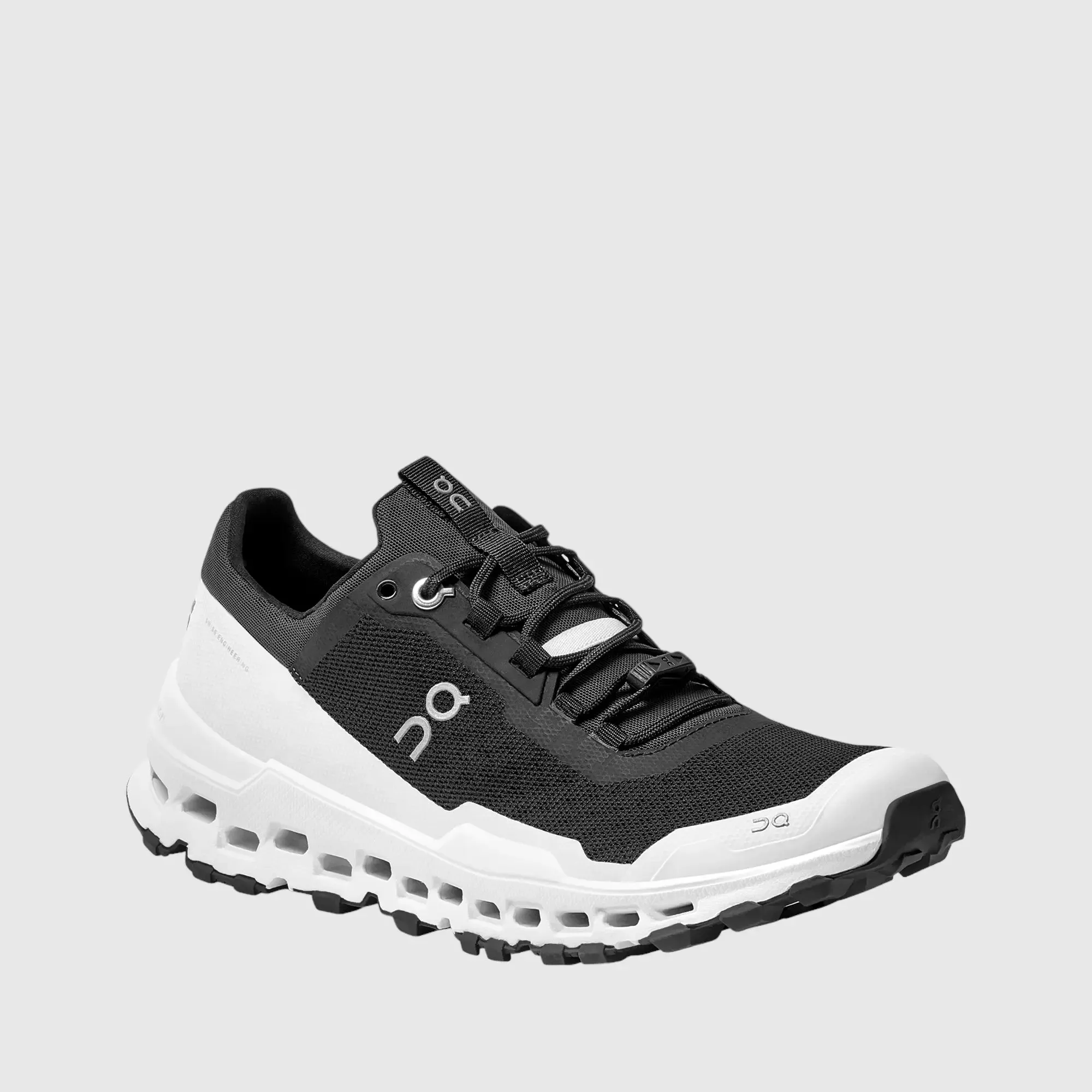 Sure! Here’s an optimized title for the product:

Mens On Cloud Ultra Running Shoes - Black & White Performance Sneakers

This title includes modifiers that highlight the brand, style, and intended use of the shoes.